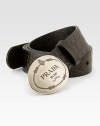 Logo metal buckle joins together this embossed leather design.LeatherAbout 1½ wideMade in Italy