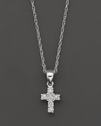 A heavenly diamond cross pendant in 14 Kt. white gold, with rope chain. A heavenly diamond cross pendant in 14 Kt. white gold, with rope chain.