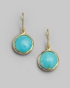 From the Lollipop Collection. Distinctively faceted turquoise drops set in gleaming 18k yellow gold. Turquoise 18k yellow gold Drop, about 1 Diameter, about ½ Ear wire Imported