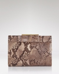 Take bold style out for the night with this python-embossed leather clutch from Badgley Mischka. Ideally sized for the essentials, it's destined to be your new party favorite. Take bold style out for the night with this python-embossed leather clutch from Badgley Mischka. Ideally sized for the essentials, it's destined to be your new party favorite.