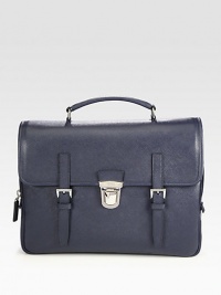 Signature briefcase style of saffiano leather with double strap closure.Flap, push lock closureTop handleInterior zip pocketsLeather14W x 11H x 4DMade in Italy Signature briefcase style of saffiano leather with double strap closure.Flap, push lock closureTop handleInterior zip pocketsLeather14W x 11H x 4DMade in Italy