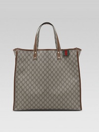 A signature design in GG-coated fabric with leather trim. Double handles Signature web loop Interior pocket 17¾W X 15¾H X 4¼D Made in Italy A signature design in GG-coated fabric with leather trim. Double handles Signature web loop Interior pocket 17¾W X 15¾H X 4¼D Made in Italy