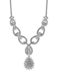 Adorn your neckline with just the right amount of sparkle. This stunning necklace incorporates cut-out links and a pear-shaped sunburst pendant accented by round-cut diamonds (1 ct. t.w.). Set in 14k white gold. Approximate length: 16-1/2 inches. Approximate drop: 1 inch. Adorn your neckline with just the right amount of sparkle. This stunning necklace incorporates cut-out links and a pear-shaped sunburst pendant accented by round-cut diamonds (1 ct. t.w.). Set in 14k white gold. Approximate length: 16-1/2 inches. Approximate drop: 1 inch.