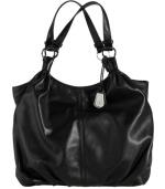 Pretty pleats and soft leather update this classic carry-all tote by Cole Haan. Silvertone hardware and a signature charm add the perfect subtle finishing touches.