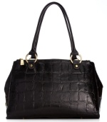 Opt for the exotic in your everyday accessorizing with this posh, croc-embossed leather tote from Giani Bernini that's finished with distinctive detailing. Perfectly sized and outfitted with plenty of pockets and compartments to handle all your for day-to-night demands.