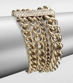 An elegant piece with link chains in various sizes gathered in a multi-row design. Antique-finished goldtoneLength, about 8Slide closureImported 
