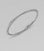A simply twisted cable bangle of sterling silver is the essence of Yurman style. Sterling silver Cable, 4mm Diameter, about 2½ Made in USA