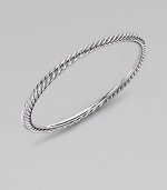 A simply twisted cable bangle of sterling silver is the essence of Yurman style. Sterling silver Cable, 4mm Diameter, about 2½ Made in USA
