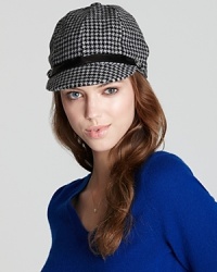 Add equestrian flair to any ensemble with Lauren Ralph Lauren's leather-accented, houndstooth cap. Add equestrian flair to any ensemble with Lauren Ralph Lauren's leather-accented, houndstooth cap.