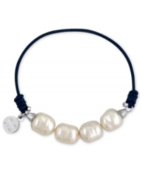 Majorica explores its whimsical side with this bracelet. Organic man-made pearls (8 mm) adorn a navy-blue elastic cord for a fun and fashionable look. Approximate length: 6-1/2 inches. Majorica explores its whimsical side with this bracelet. Organic man-made pearls (8 mm) adorn a navy-blue elastic cord for a fun and fashionable look. Approximate length: 6-1/2 inches.