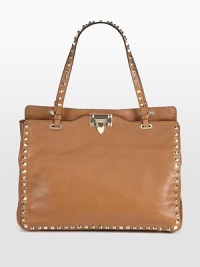 Pyramid studs lend a rock n' roll edge to this sleek leather carryall.Double top handles, 7½ dropDetachable shoulder strap, 18¼ dropFlap-lock closureProtective metal feetOne inside zip pocketTwo inside open pocketsCotton lining13W X 10¼H X 5DMade in Italy Pyramid studs lend a rock n' roll edge to this sleek leather carryall.Double top handles, 7½ dropDetachable shoulder strap, 18¼ dropFlap-lock closureProtective metal feetOne inside zip pocketTwo inside open pocketsCotton lining13W X 10¼H X 5DMade in Italy
