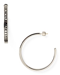 MARC BY MARC JACOBS continues to be the label to love, so stay a step ahead with these hoop earrings. Decked in the MBMJ logo, this pair has style-setter written all over it. MARC BY MARC JACOBS continues to be the label to love, so stay a step ahead with these hoop earrings. Decked in the MBMJ logo, this pair has style-setter written all over it.