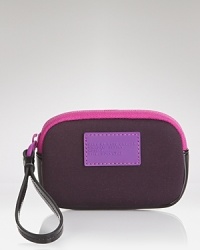 Whether you're grooving in general admission or dashing downtown, this color block iPhone case from MARC BY MARC JACOBS dandles daintily from your wrist. Whether you're grooving in general admission or dashing downtown, this color block iPhone case from MARC BY MARC JACOBS dandles daintily from your wrist.