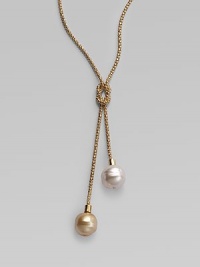 A lariat of rope-textured 18k gold vermeil with a love knot center and lustrous white and champagne baroque organic pearls dangling from each end. 14mm baroque white and champagne man-made pearls 18k gold vermeil Length adjusts from about 18 to 24 Made in Spain