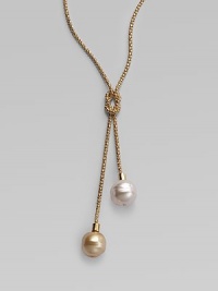 A lariat of rope-textured 18k gold vermeil with a love knot center and lustrous white and champagne baroque organic pearls dangling from each end. 14mm baroque white and champagne man-made pearls 18k gold vermeil Length adjusts from about 18 to 24 Made in Spain A lariat of rope-textured 18k gold vermeil with a love knot center and lustrous white and champagne baroque organic pearls dangling from each end. 14mm baroque white and champagne man-made pearls 18k gold vermeil Length adjusts from about 18 to 24 Made in Spain