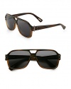 A modern rendition of the signature aviator frame crafted in lightweight resin with metal hardware detail for a sharp finish. Available in shiny brown horn frames with gradient smoke lenses.Resin100% UV ProtectionMade in Italy