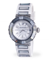 Who says you can't have it all? The Octea Sport watch by Swarovski is both glamorous and sporty. White rubber strap with six clear crystals and round stainless steel case. Clear crystal rotating bezel. White dial features applied silver tone numerals and stick indices, minute track, date window at three o'clock, luminous hands and logo. Swiss movement. Water resistant to 30 meters. Two-year limited warranty. Who says you can't have it all? The Octea Sport watch by Swarovski is both glamorous and sporty. White rubber strap with six clear crystals and round stainless steel case. Clear crystal rotating bezel. White dial features applied silver tone numerals and stick indices, minute track, date window at three o'clock, luminous hands and logo. Swiss movement. Water resistant to 30 meters. Two-year limited warranty.