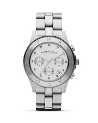 Tap into the men's-inspired trend with MARC BY MARC JACOBS glitzy three-eye chronograph. Wear this silvery statement watch to trim nouveau-prep looks. Tap into the men's-inspired trend with MARC BY MARC JACOBS glitzy three-eye chronograph. Wear this silvery statement watch to trim nouveau-prep looks.