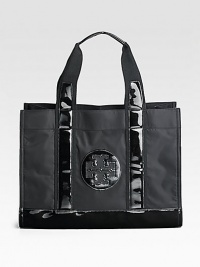 This simple and roomy style in sturdy nylon, with glossy PVC trim is the perfect accessory for a day trip or running errands around town.Double top handles, 6½ drop Open top Two inside zip pockets Canvas lining 15½W X 12H X 6D Imported This simple and roomy style in sturdy nylon, with glossy PVC trim is the perfect accessory for a day trip or running errands around town.Double top handles, 6½ drop Open top Two inside zip pockets Canvas lining 15½W X 12H X 6D Imported