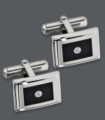 Polished and presentable. Accent your favorite work shirt with these sleek cuff links. Crafted in stainless steel, cuff links features a rectangular black enamel design with a sparkling diamond accent. Surface coated with a scratch-resistant clear finish. Cuff links have swivel backs for ease of use. Approximate length: 5/8 inch. Approximate width: 1/2 inch.