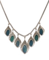 Spread your wings and take on the turquoise trend with this posh, peacock feather necklace from Lucky Brand. Semi-precious turquoise stones elegantly dangle from a charming chain-link collar. Crafted in silver tone mixed metal. Approximate length: 20 inches. Approximate drop: 1-5/8 inches. Spread your wings and take on the turquoise trend with this posh, peacock feather necklace from Lucky Brand. Semi-precious turquoise stones elegantly dangle from a charming chain-link collar. Crafted in silver tone mixed metal. Approximate length: 20 inches. Approximate drop: 1-5/8 inches.