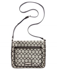 Add some signature style to your tech accessorizing with this jacquard logo silhouette from Nine West. Button snap and top zip closures securely stow iPad when you're on-the-move, while the convenient crossbody strap keeps hands free. Add some signature style to your tech accessorizing with this jacquard logo silhouette from Nine West. Button snap and top zip closures securely stow iPad when you're on-the-move, while the convenient crossbody strap keeps hands free.