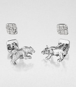 Shiny sterling silver cuff links in a moneyed bull & bear design.Sterling silverAbout .87 diam.Made in USA