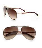 This aviator style exudes effortless cool, crafted in lightweight metal with grommet detail. Available in gold frames with brown lenses.Metal100% UV ProtectionMade in Italy