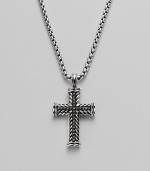 A finely detailed silver chevron cross pendant is centered with brilliant black pavé diamonds. Diamonds, 0.65 tcw Chain length 22 Imported