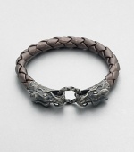 EXCLUSIVELY AT SAKS. A braided strand of luxuriously, smooth leather is offset by a sculpted sterling silver clasp.LeatherSterling silverAbout 3 diam.Imported
