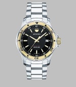 Two-tone stainless steel in a sleek, understated design for a classic time piece.Swiss quartz movement Water resistant to 20 ATM Goldplated stainless steel bezel with minute markers Round stainless steel case, 40mm, (1.57) Sapphire crystal Black dial Index hour markers Date display at 3 o'clock Second hand Stainless steel link bracelet Deployment buckle Made in Switzerland 