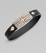 From the Alchemy in the UK Collection. A bold Union Jack of sterling silver, textured, studded and finished with rose goldplatng on a black leather strap.Sterling silverRose goldplatedLeatherLength, about 8½Magnetic claspImported