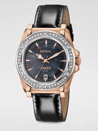 Dark and dramatic, this two-tone design combines stainless steel and rose goldplating, plus the dazzle of Swarovski crystals and the polish of a black patent leather strap.Quartz movementWater resistant to 10 ATMStainless steel round case with IP rose goldplating, 37.5mm diameter (1.48)Crystal bezelBlack mother-of-pearl dialArabic numerals and bar hour markersSecond handDate display at 6:00Black patent leather strapImported Dark and dramatic, this two-tone design combines stainless steel and rose goldplating, plus the dazzle of Swarovski crystals and the polish of a black patent leather strap.Quartz movementWater resistant to 10 ATMStainless steel round case with IP rose goldplating, 37.5mm diameter (1.48)Crystal bezelBlack mother-of-pearl dialArabic numerals and bar hour markersSecond handDate display at 6:00Black patent leather strapImported