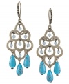 Update your look with intricate design and a touch of color. Carolee's elegant chandelier earrings feature a cut-out teardrop design with reconstituted turquoise drops and faceted glass beads. Set in burnished gold tone mixed metal. Approximate drop: 2-3/4 inches.