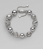 From the Elements Collection. An eclectic mix of smooth and textured sterling silver with an adjustable bead clasp.Sterling silver Length, about 7½ Adjustable oval bead clasp Imported 