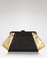 Z Spoke Zac Posen takes the textured trend out for the night with this clutch, coolly crafted of leather with cork trims. Carry it to send a mixed material message. Z Spoke Zac Posen takes the textured trend out for the night with this clutch, coolly crafted of leather with cork trims. Carry it to send a mixed material message.