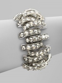 Bold, open arcs set with shimmering faceted Swarovski crystals.CrystalSilverplatedWidth, about 1Length, about 6½Hidden magnetic claspMade in Italy Bold, open arcs set with shimmering faceted Swarovski crystals.CrystalSilverplatedWidth, about 1Length, about 6½Hidden magnetic claspMade in Italy