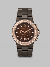 A brilliant timepiece with peach crystal accents, rose goldtone stainless steel details and espresso ceramic link bracelet. Quartz movementWater resistant to 5 ATMRound espresso ceramic case, 43mm (1.7)Light peach crystal bezelBrown chronograph dialNumeric and peach crystal hour markersDate display at 6 o'clockSecond hand Espresso ceramic link braceletImported A brilliant timepiece with peach crystal accents, rose goldtone stainless steel details and espresso ceramic link bracelet. Quartz movementWater resistant to 5 ATMRound espresso ceramic case, 43mm (1.7)Light peach crystal bezelBrown chronograph dialNumeric and peach crystal hour markersDate display at 6 o'clockSecond hand Espresso ceramic link braceletImported