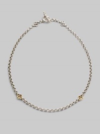 A bold sterling silver chain is accented by cloverleaf shapes of 18k gold in front and sterling silver at the closure. Sterling silver and 18k yellow gold Length, about 18 Toggle closure Made in Greece A bold sterling silver chain is accented by cloverleaf shapes of 18k gold in front and sterling silver at the closure. Sterling silver and 18k yellow gold Length, about 18 Toggle closure Made in Greece