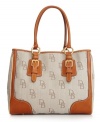 A signature style from Dooney & Bourke that will add an elegant touch to any outfit. A spacious design with classic detailing is a must-have for every girl's designer handbag collection.