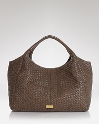 Coolly woven leather gives this Cornelia Guest hobo added interest. But it's the ultra-spacious shape that makes it a day-in-and-out must-have. Coolly woven leather gives this Cornelia Guest hobo added interest. But it's the ultra-spacious shape that makes it a day-in-and-out must-have.