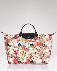 Longchamp's reliable French design goes graphic with this bright tote. Shoulder the color-splashed carryall for a practical pick-me-up--it's sized just right for all your essentials. Longchamp's reliable French design goes graphic with this bright tote. Shoulder the color-splashed carryall for a practical pick-me-up--it's sized just right for all your essentials.