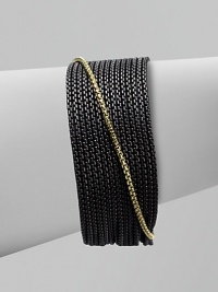 From the Chain Collection. A sizable design with sleek blackened sterling silver box link chains and an 18k gold box link chain accent. Blackened sterling silver18k goldLength, about 7Push clasp closureImported 