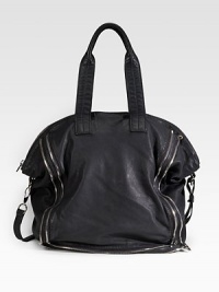Roomy and shapely, this tote of buttery soft leather is boldly outlined with decorative zippers. Double top handles, 8 drop Detachable shoulder strap, 17½ drop Top zipper close Protective metal feet One inside zip pocket Two inside open pockets Fully lined 14½W X 15½H X 6D Imported Roomy and shapely, this tote of buttery soft leather is boldly outlined with decorative zippers. Double top handles, 8 drop Detachable shoulder strap, 17½ drop Top zipper close Protective metal feet One inside zip pocket Two inside open pockets Fully lined 14½W X 15½H X 6D Imported