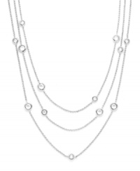 Inch upon inch of brilliant sparkle. Eliot Danori's elegantly-layered necklace highlights bezel-set cubic zirconias (2-3/4 ct. t.w.) strung from delicate chains. Crafted from silver tone mixed metal. Approximate length: 54 inches. Inch upon inch of brilliant sparkle. Eliot Danori's elegantly-layered necklace highlights bezel-set cubic zirconias (2-3/4 ct. t.w.) strung from delicate chains. Crafted from silver tone mixed metal. Approximate length: 54 inches.