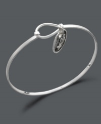 Always aim for the stars. This subtly stylish bangle features an engraved shooting star charm with the words believe in the beauty of your dreams on the flip side. Crafted in sterling silver. Approximate diameter: 2-3/10 inches. Always aim for the stars. This subtly stylish bangle features an engraved shooting star charm with the words believe in the beauty of your dreams on the flip side. Crafted in sterling silver. Approximate diameter: 2-3/10 inches.