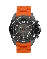 Make a statement with this bold watch from MICHAEL Michael Kors, boasting a gunmetal dial. Sporty yet sleek, this piece ensures you're always ready for action. Make a statement with this bold watch from MICHAEL Michael Kors, boasting a gunmetal dial. Sporty yet sleek, this piece ensures you're always ready for action.