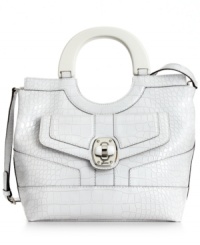 The perfect blend of poise and edge. This feminine carryall from GUESS is covered in a shiny crocodile print with glam silver-tone accents and a zip-aroud closure. The perfect blend of poise and edge. This feminine carryall from GUESS is covered in a shiny crocodile print with glam silver-tone accents and a zip-aroud closure.