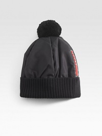 Nylon and wool puffer hat with pom pom detail.Ribbed hemNylon/woolDry cleanMade in Italy Nylon and wool puffer hat with pom pom detail.Ribbed hemNylon/woolDry cleanMade in Italy
