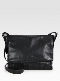 Quilted bottom adds an elegant finish to this practical, yet polished crossbody messenger constructed in supple calfskin leather.Flap closureAdjustable crossbody strapInterior pocketsLeather14W x 12H x 4DImported Quilted bottom adds an elegant finish to this practical, yet polished crossbody messenger constructed in supple calfskin leather.Flap closureAdjustable crossbody strapInterior pocketsLeather14W x 12H x 4DImported